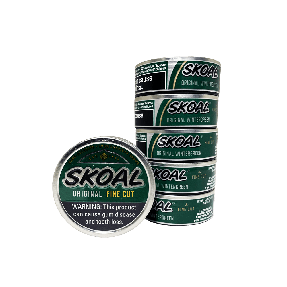 Skoal Original Fine Cut dipping tobacco tin top view showing green lid with Skoal logo, Original Fine Cut label, Hand Selected 100% American Grown designation, and Est. 1934 - buy Skoal Original dip online